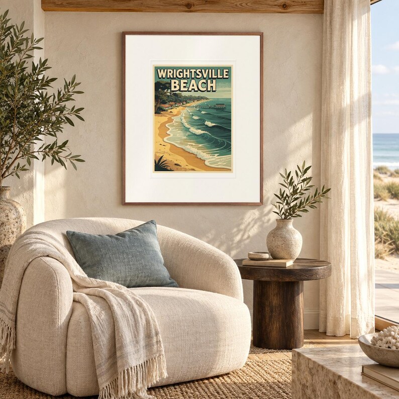 Wrightsville Beach Surf print in a Red Oak frame with a white mat in a light-filled coastal sitting room.