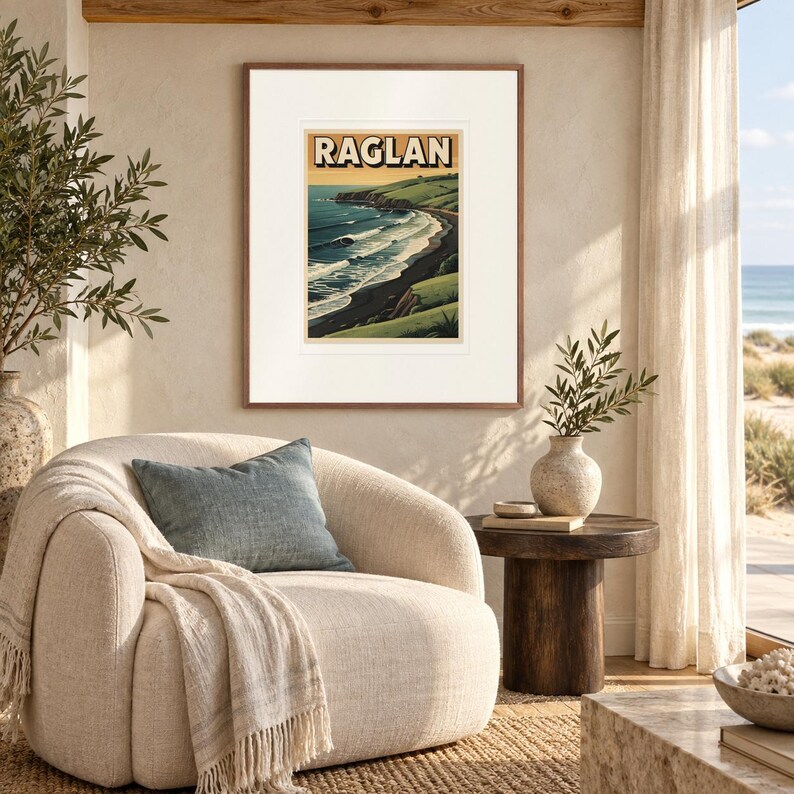 Raglan New Zealand Surf print in a Red Oak frame with a white mat in a light-filled coastal sitting room.