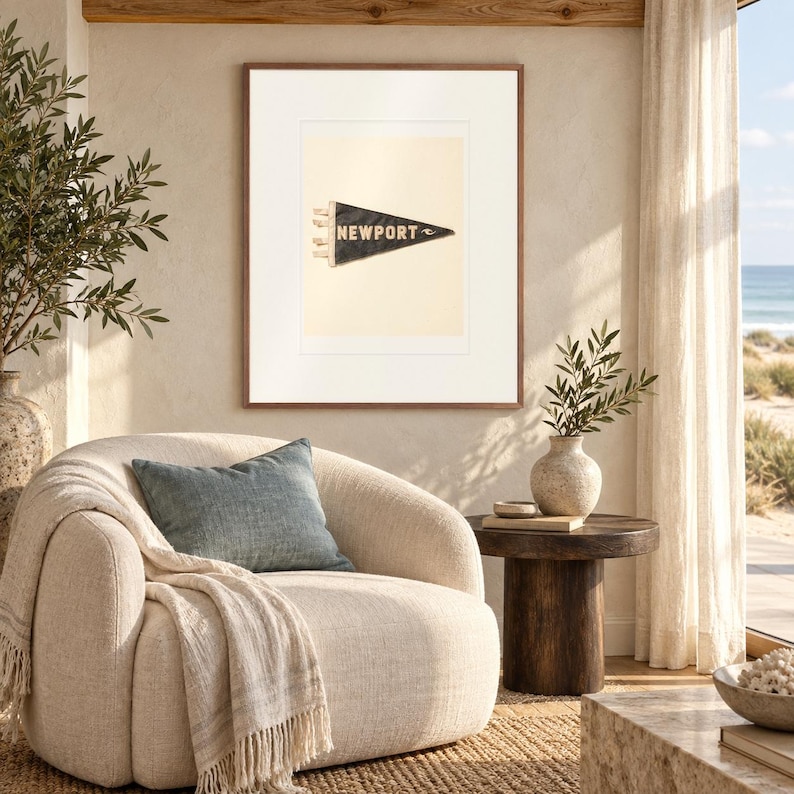 Newport, Rhode Island Surf Pennant print in a Red Oak frame with a white mat in a light-filled coastal sitting room.