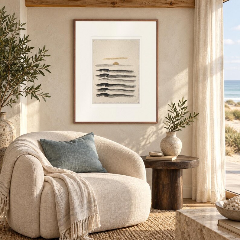 Layered Waves Ink Style print in a Red Oak frame with a white mat in a light-filled coastal sitting room.