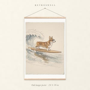 Corgi Surfing oak hanger poster, 24 by 36 inches, with natural wood rails and a hanging cord.