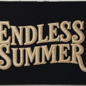 Endless Summer Embroidered Patch Print framed in a beach-style living room setting