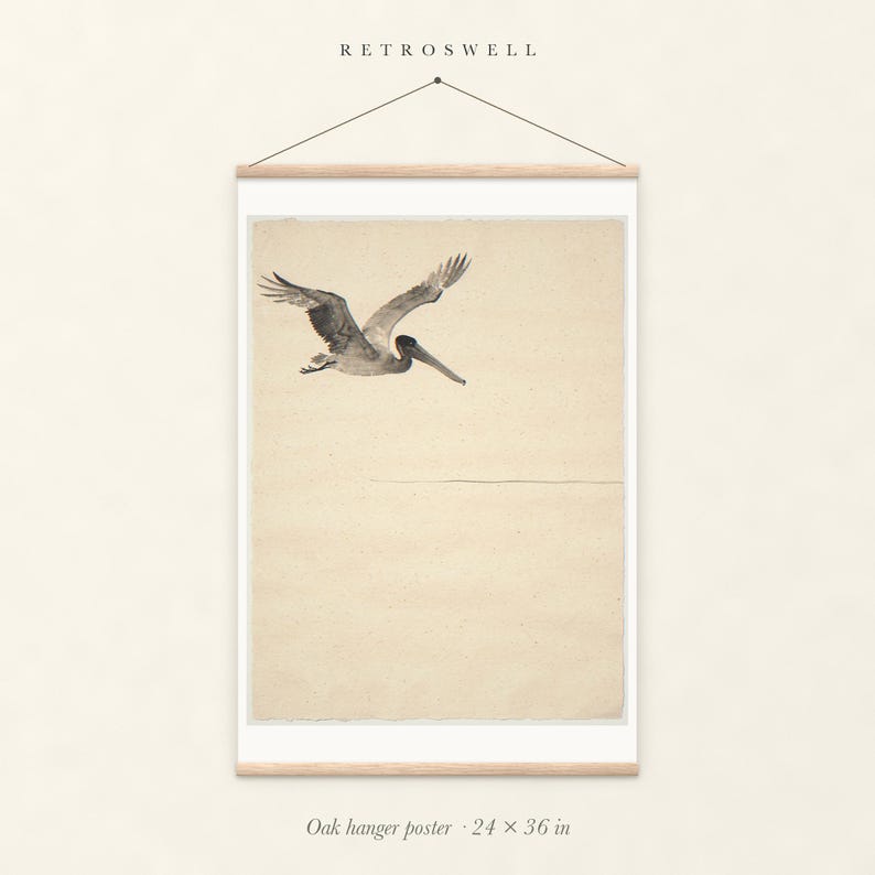Flying Pelican Ink Style oak hanger poster, 24 by 36 inches, with natural wood rails and a hanging cord.