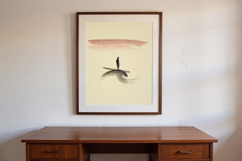 Sumi-e Lone Surfer with Rose Dawn Accent Print framed in a home office setting