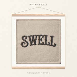 Swell Patch oak hanger poster, 18 by 18 inches, with natural wood rails and a hanging cord.