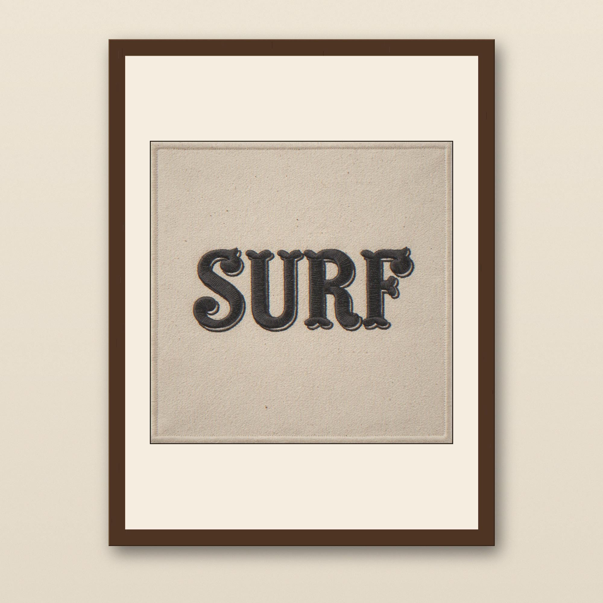 Surf Embroidered Patch Print - walnut framed art print with cream mat on plaster wall