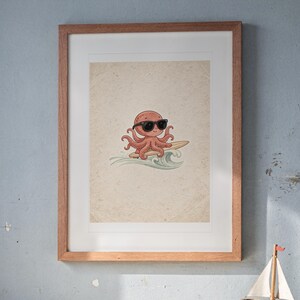 Surfing Octopus print in a Red Oak frame with a white mat, hanging above the bookshelf in a nursery.