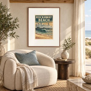 Rockaway Beach Surf print in a Red Oak frame with a white mat in a light-filled coastal sitting room.