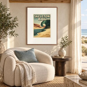 Skeleton Bay Namibia Surf print in a Red Oak frame with a white mat in a light-filled coastal sitting room.