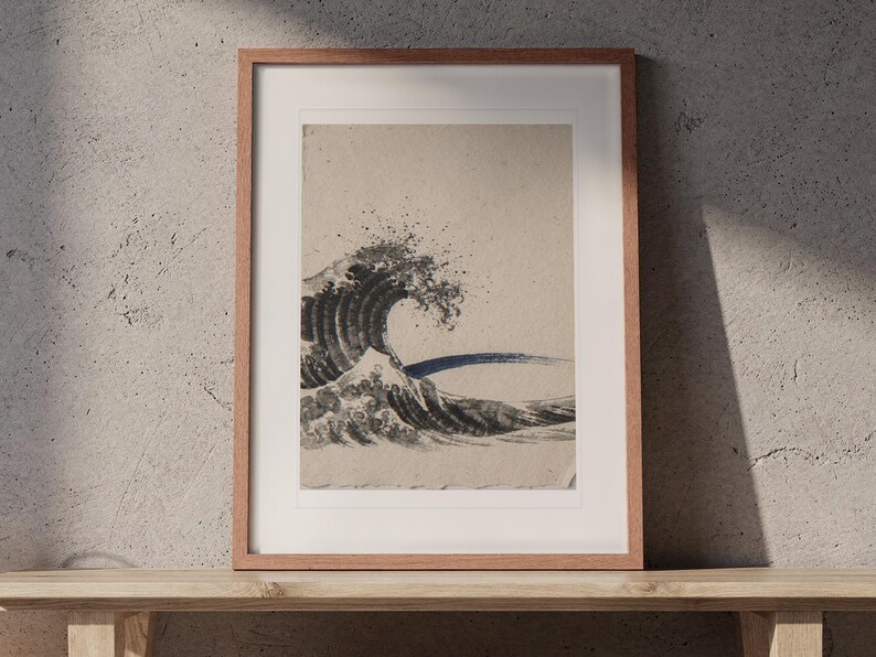 Crashing Wave Ink Style print in a Red Oak frame with a white mat, leaning on the bench against the wall in a japandi living room.