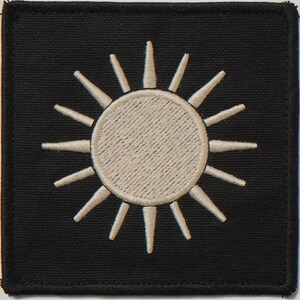Sun embroidered-style patch unframed printed artwork and full composition with its paper border.