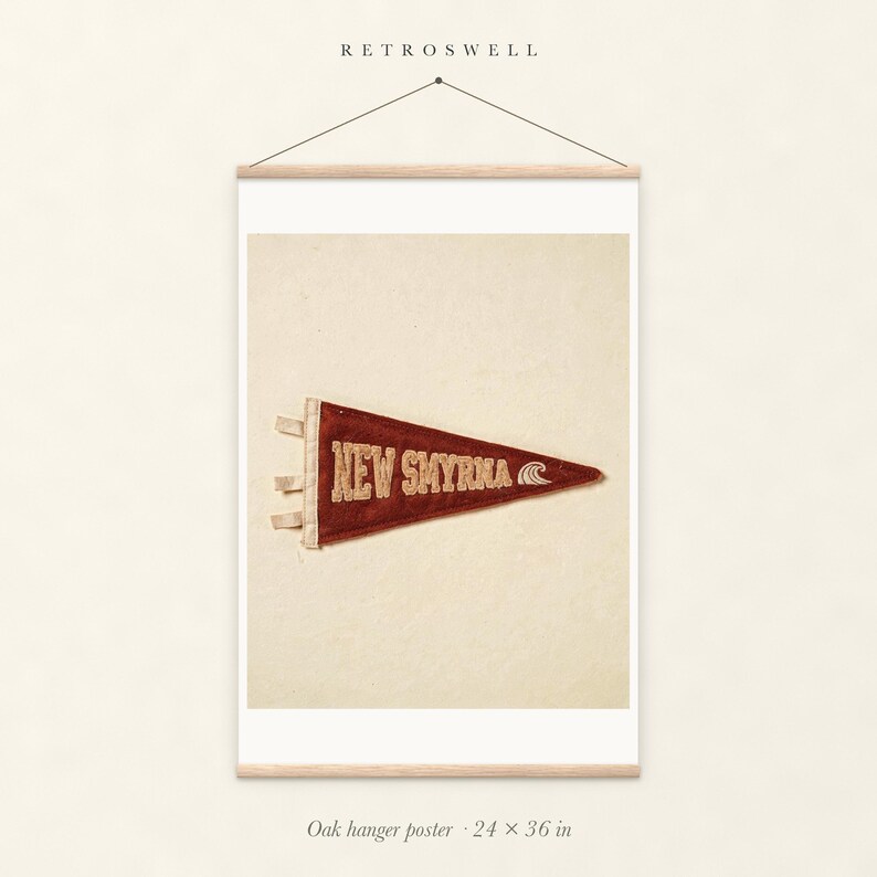 New Smyrna Beach Surf Pennant oak hanger poster, 24 by 36 inches, with natural wood rails and a hanging cord.