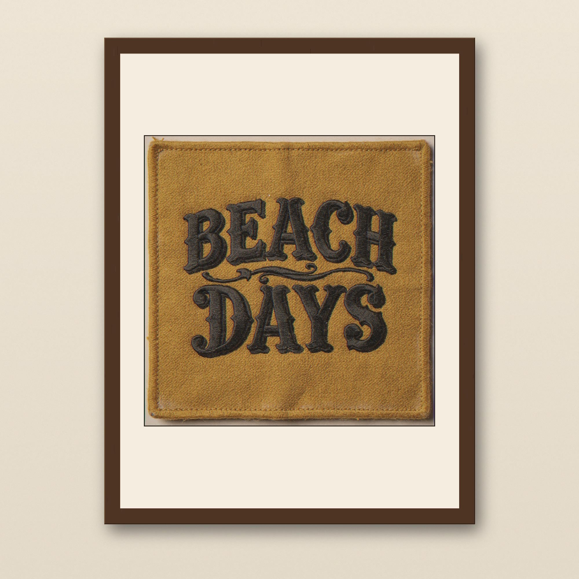 Beach Days Embroidered Patch Print - walnut framed art print with cream mat on plaster wall