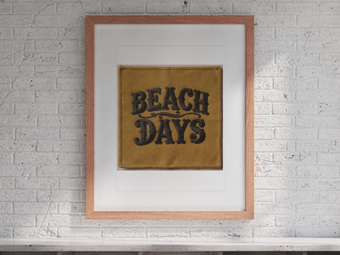 Beach Days Patch print in a Red Oak frame with a white mat, hanging above the cubbies in a mudroom.