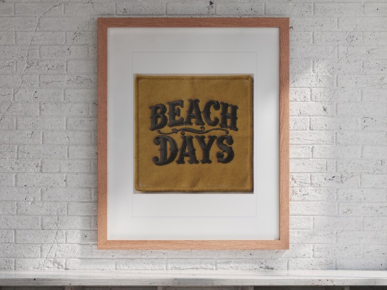 Beach Days Patch print in a Red Oak frame with a white mat, hanging above the cubbies in a mudroom.