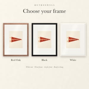 Frame options for Bells Beach Surf Pennant: Red Oak, black and white wood frames, each with a white mat.