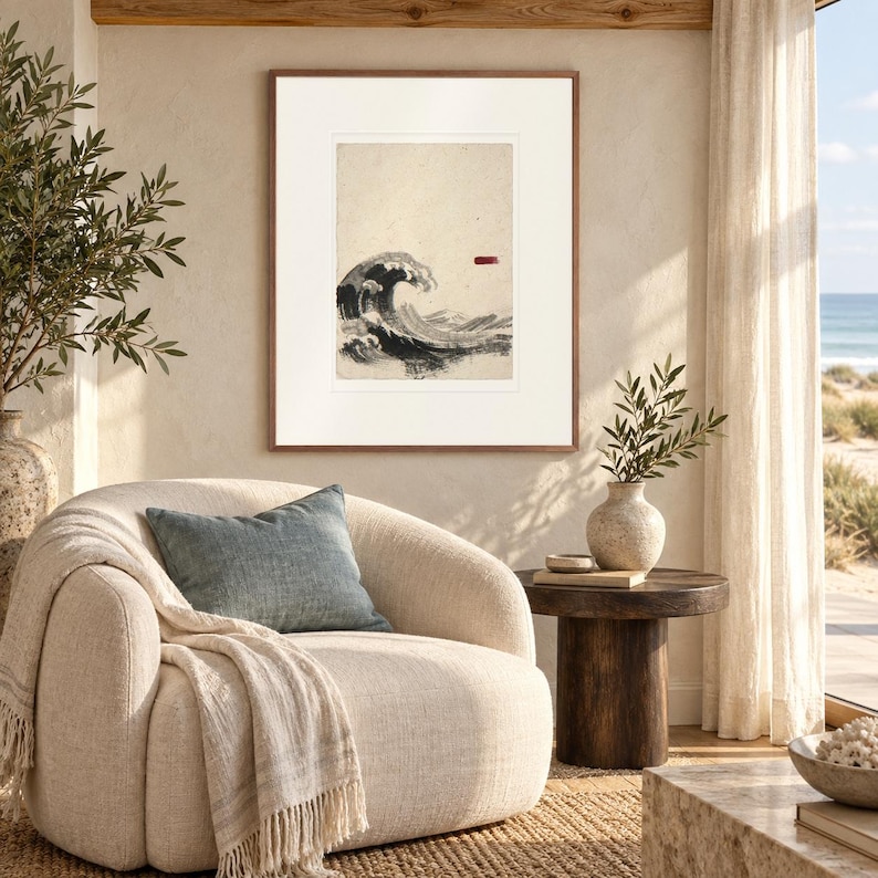 Wave Ink Style print in a Red Oak frame with a white mat in a light-filled coastal sitting room.