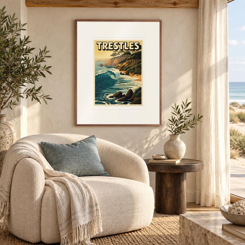 Trestles California Surf print in a Red Oak frame with a white mat in a light-filled coastal sitting room.