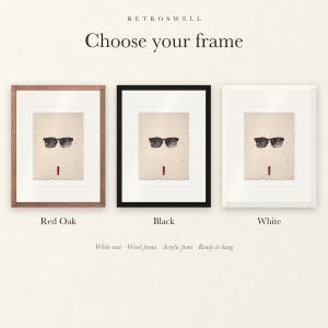 Frame options for Sunglasses Ink Style: Red Oak, black and white wood frames, each with a white mat.