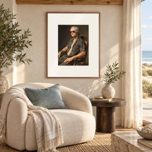 Alexander Hamilton Surfer print in a Red Oak frame with a white mat in a light-filled coastal sitting room.