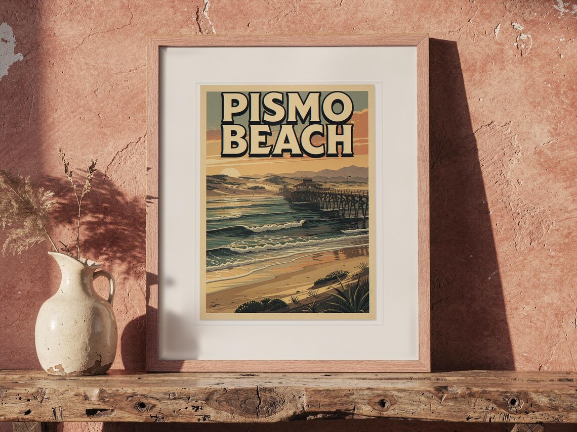 Pismo Beach Surf Travel Poster print in a Red Oak frame with a white mat, leaning on the bench against the wall in a boho living room.