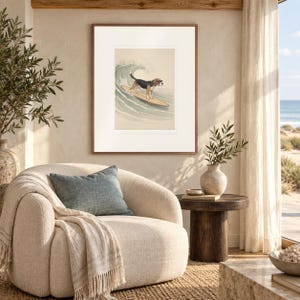 Beagle Surfing print in a Red Oak frame with a white mat in a light-filled coastal sitting room.