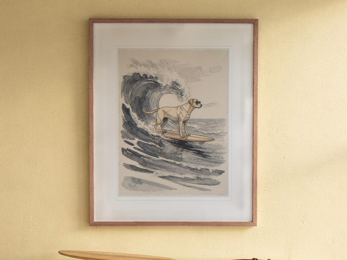 Labrador Surfing print in a Red Oak frame with a white mat, hanging above the bookshelf in a kids' room.