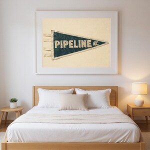 Pipeline Vintage Surf Pennant Print framed in a modern bedroom setting