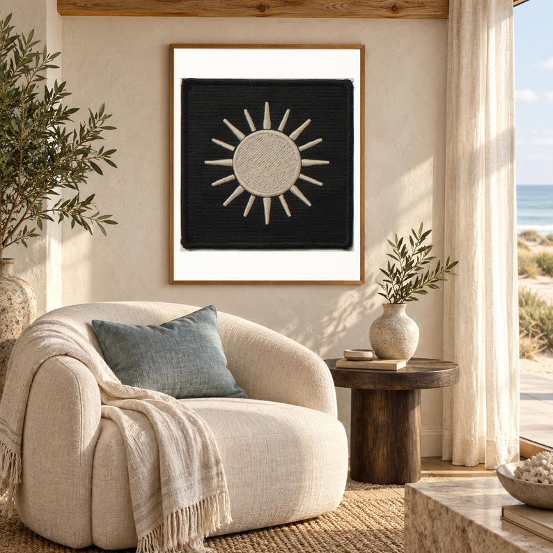 Sun Embroidered Patch Print art print shown framed in a light-filled coastal living room (frame not included). RetroSwell digital download.