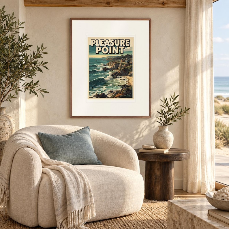 Pleasure Point Surf print in a Red Oak frame with a white mat in a light-filled coastal sitting room.