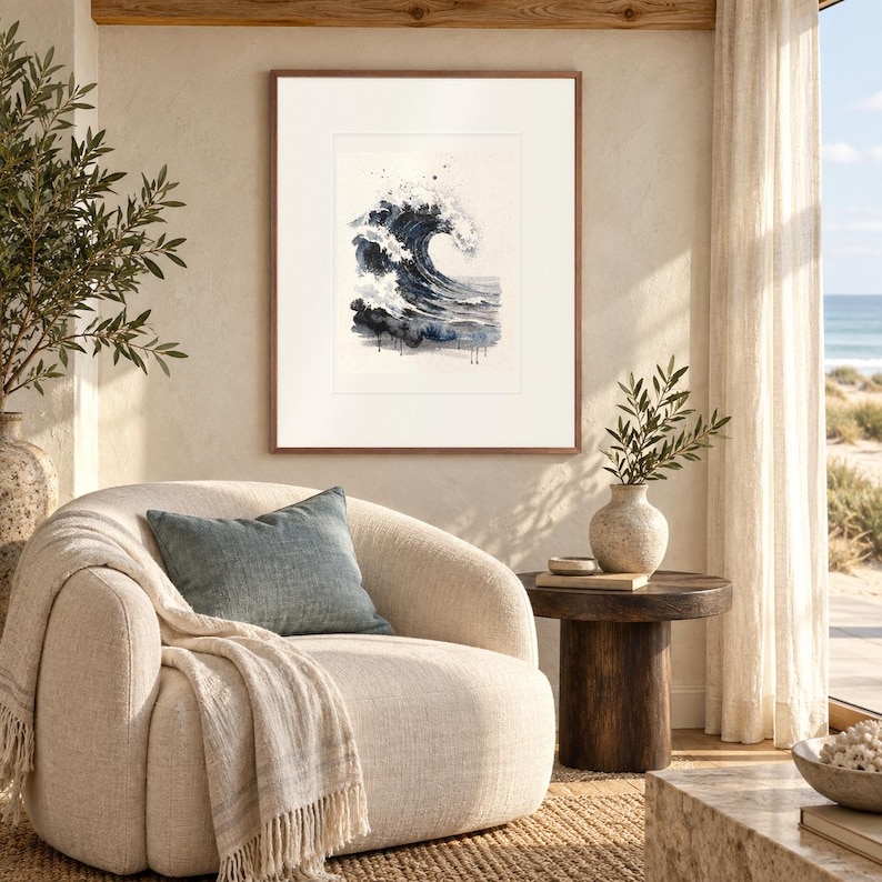 Storm Wave Watercolor print in a Red Oak frame with a white mat in a light-filled coastal sitting room.