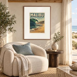 Malibu Surf print in a Red Oak frame with a white mat in a light-filled coastal sitting room.