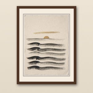 Sumi-e Seven Waves with Gold Accent Print - walnut framed art print with cream mat on plaster wall
