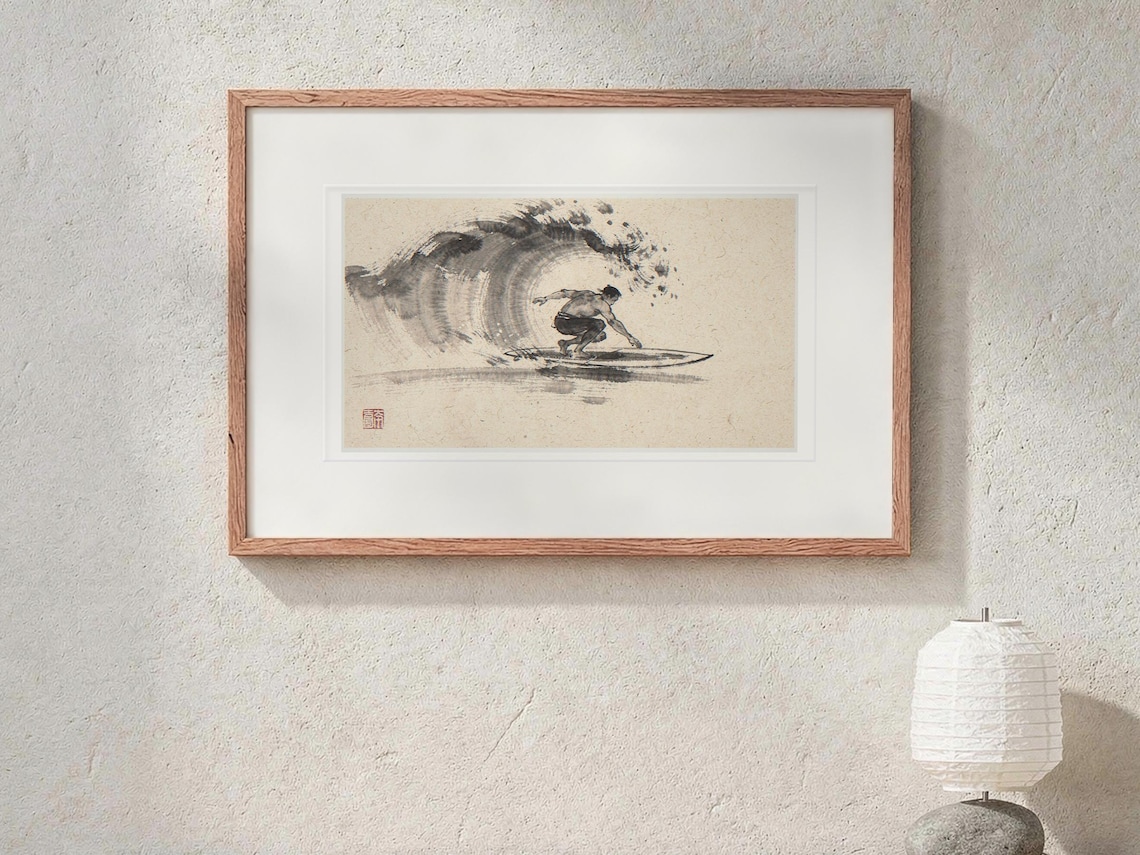 Surfer Cutback Xieyi Ink print in a Red Oak frame with a white mat, hanging above the console in a japandi living room.