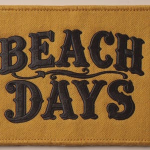 Beach Days Embroidered Patch Print framed in a coastal dining room setting