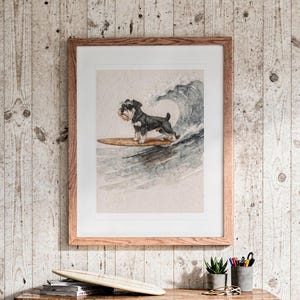 Miniature Schnauzer Surfing print in a Red Oak frame with a white mat, hanging above the dresser in a surf shack bedroom.