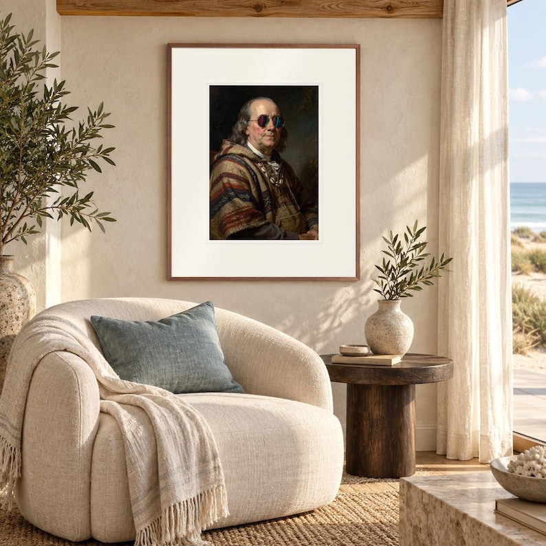 Benjamin Franklin print in a Red Oak frame with a white mat in a light-filled coastal sitting room.