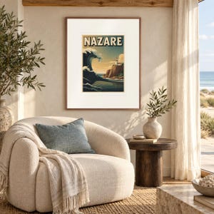 Nazare Surf print in a Red Oak frame with a white mat in a light-filled coastal sitting room.