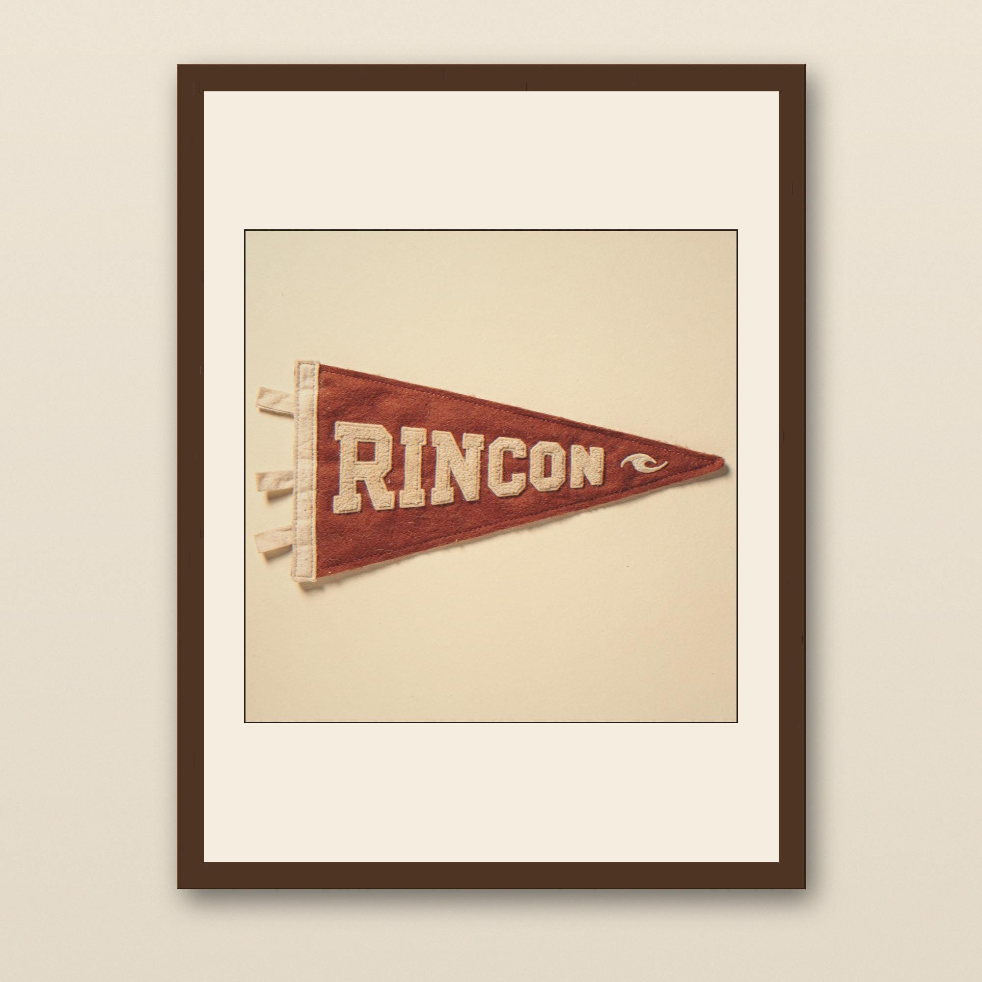 Rincon Vintage Surf Pennant Print - walnut framed art print with cream mat on plaster wall