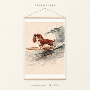 Cavalier King Charles Spaniel Surfing oak hanger poster, 24 by 36 inches, with natural wood rails and a hanging cord.