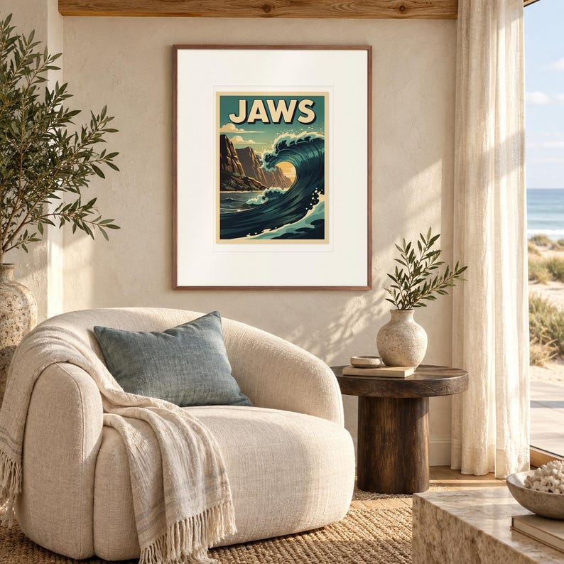 Jaws Maui Surf print in a Red Oak frame with a white mat in a light-filled coastal sitting room.