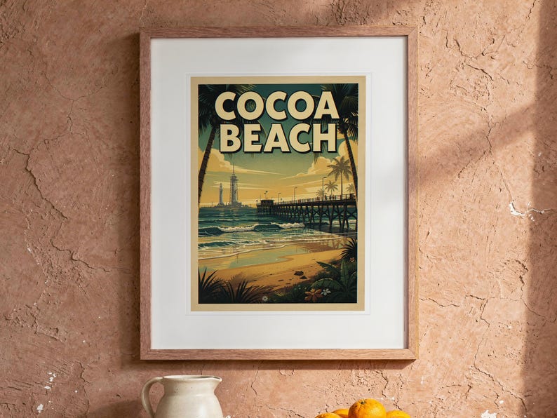 Cocoa Beach Surf Travel Poster print in a Red Oak frame with a white mat, hanging above the table in a boho living room.