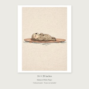 Sea Otter on Surfboard unframed 16 by 20 inch print on enhanced matte paper, shown with its white paper border.