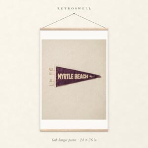 Myrtle Beach, South Carolina Surf Pennant oak hanger poster, 24 by 36 inches, with natural wood rails and a hanging cord.