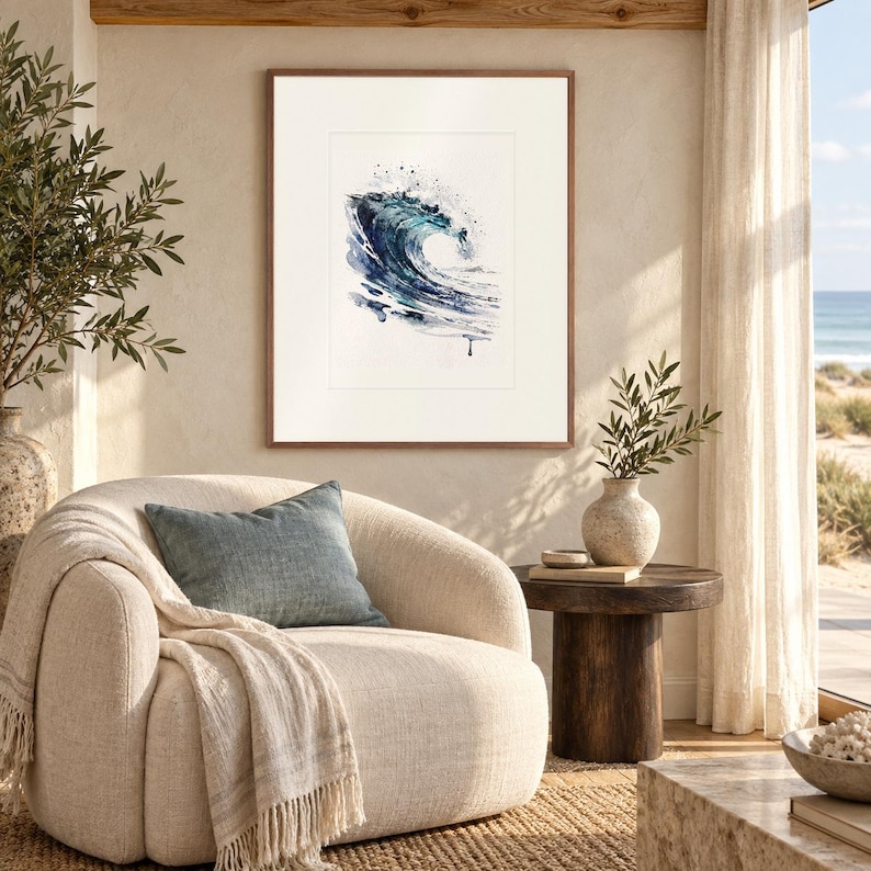 Glass Curl Wave Watercolor print in a Red Oak frame with a white mat in a light-filled coastal sitting room.