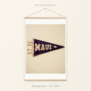 Maui Surf Pennant oak hanger poster, 24 by 36 inches, with natural wood rails and a hanging cord.