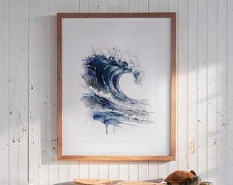 May include: A framed watercolor painting of a large, crashing ocean wave in shades of deep blue, navy, and white. The artwork is centered within a light-toned wooden frame, featuring expressive paint splatters and fluid, layered brushstrokes.