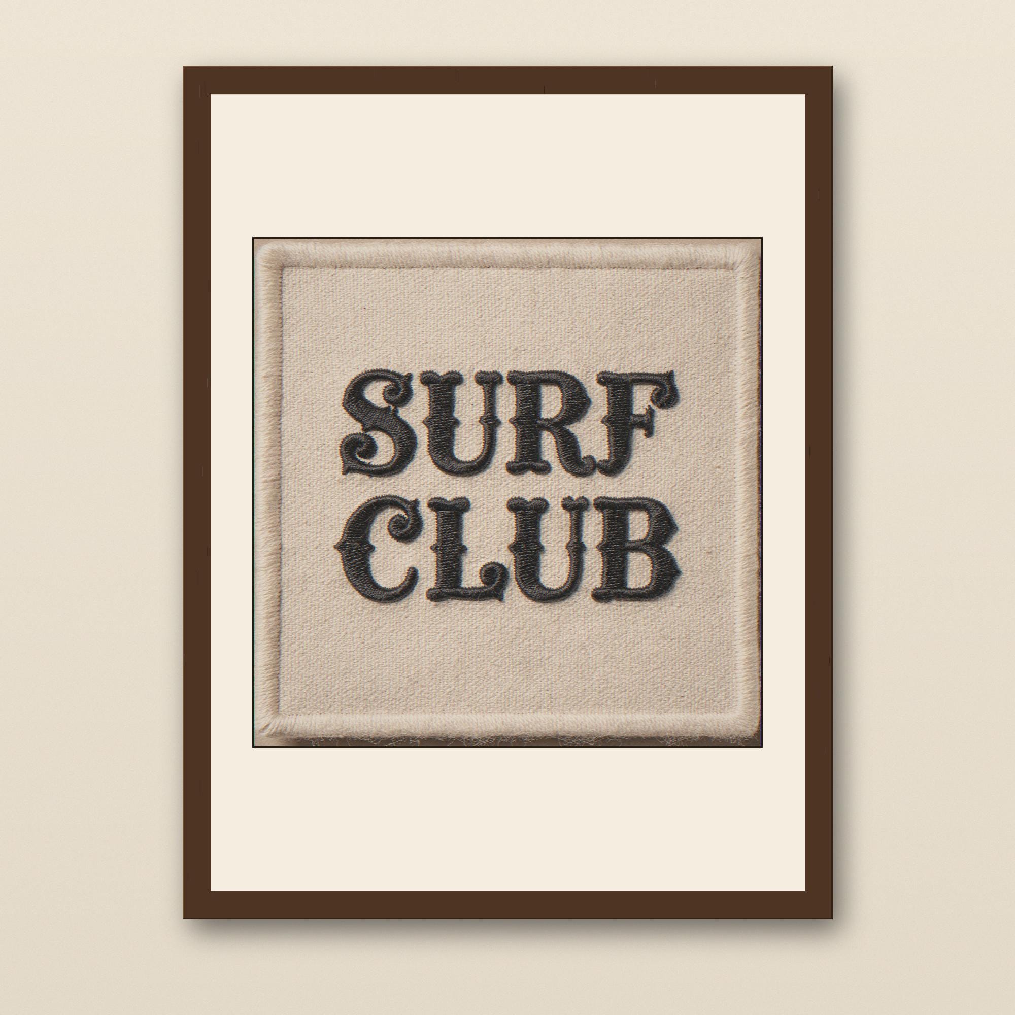 Surf Club Embroidered Patch Print - walnut framed art print with cream mat on plaster wall