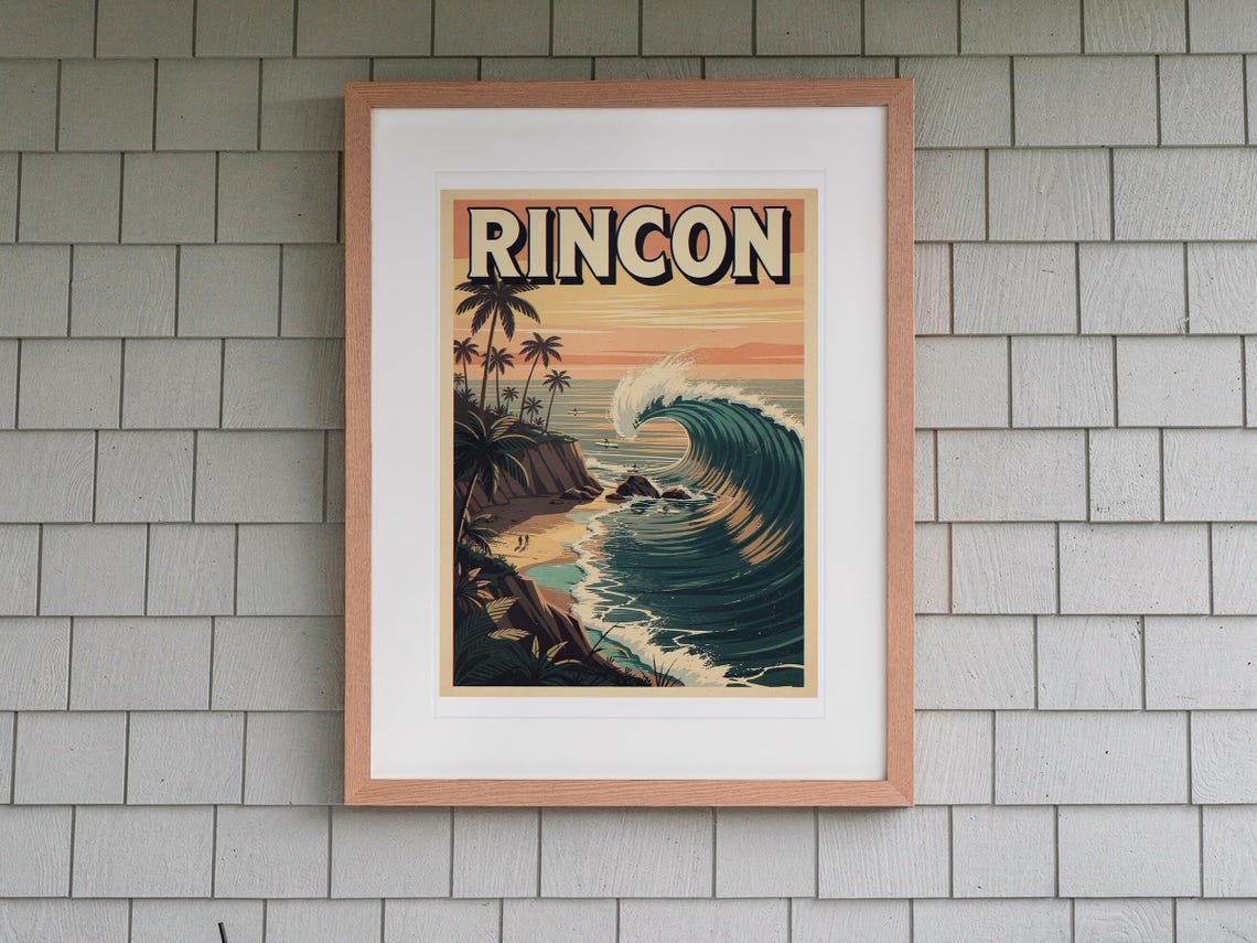 Rincon Surf Travel Poster print in a Red Oak frame with a white mat, hanging above the bench in a screened beach porch.