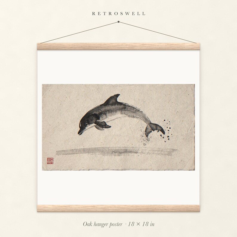 Leaping Dolphin Xieyi Ink oak hanger poster, 18 by 18 inches, the painting centred on the paper with natural wood rails and a hanging cord.